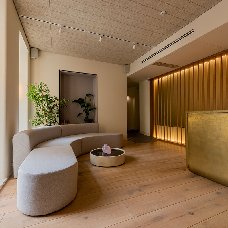 A calm, modern treatment studio interior
