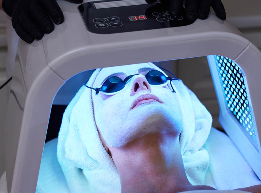 Leeds client receiving a contact-free LED facial